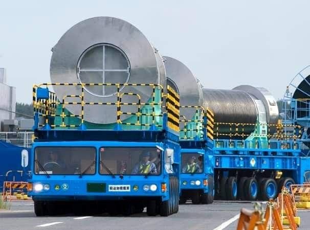 Large boiler vessel loaded for road transport