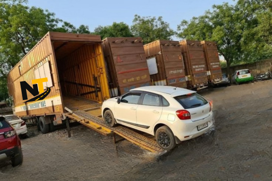 Car carrier trailer loaded with cars on the highway